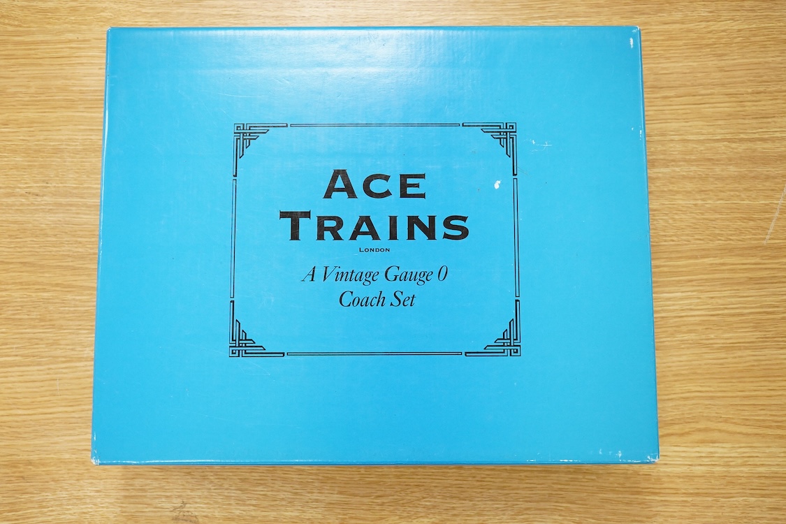 A boxed ACE Trains 0 gauge tinplate coach set; C/1 SR, comprising of three Southern Railway bogie coaches; a Full First, a Full Third and a Brake Third